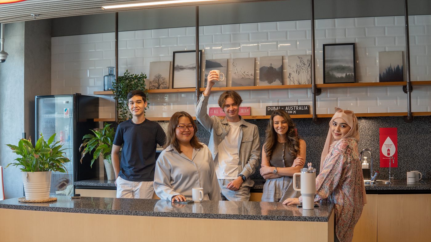 A diverse group of Murdoch University Dubai students on campus
